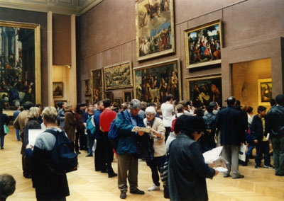 Photo in Mona Lisa room of the Louvre by John Hunter 1998