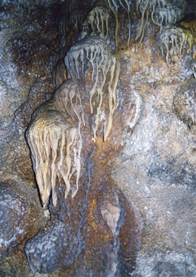 Photo of stalactite like flowstone formation by John Hunter